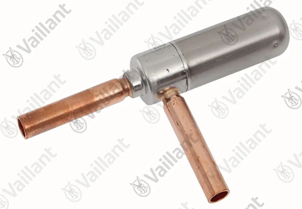 Vaillant Expansionsventil mit metallischem Gehäuse und zwei Kupferrohren. Das Gerät dient wahrscheinlich der Regelung in Heizungsanlagen.
